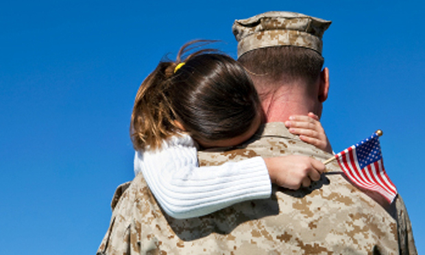 Daughter and military father (iStock)