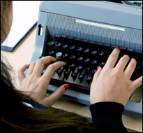 Woman at typewriter (iStock)