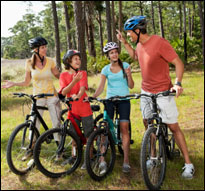 Family bicycling (iStock)