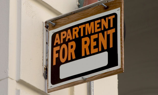 For-rent sign on building (iStock)