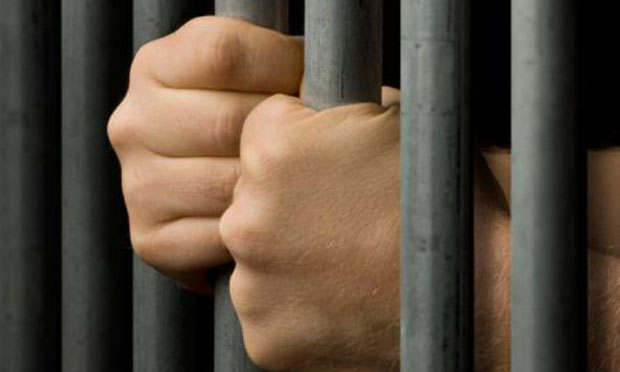Man behind bars (iStock)