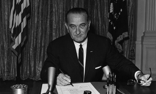 President Lyndon B. Johnson signs Tonkin resolution, 1964 (NARA)