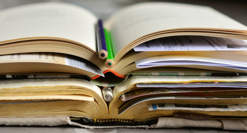 Stacks of open books