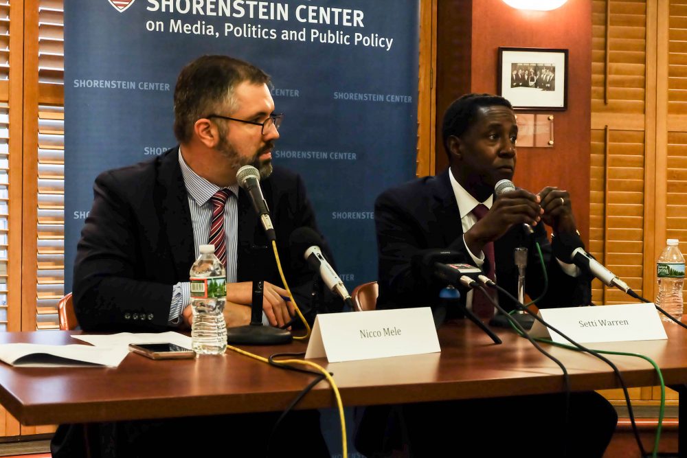Setti Warren, right, speaks while Shorenstein Center Director Nicco Mele, left, moderates the discussion.