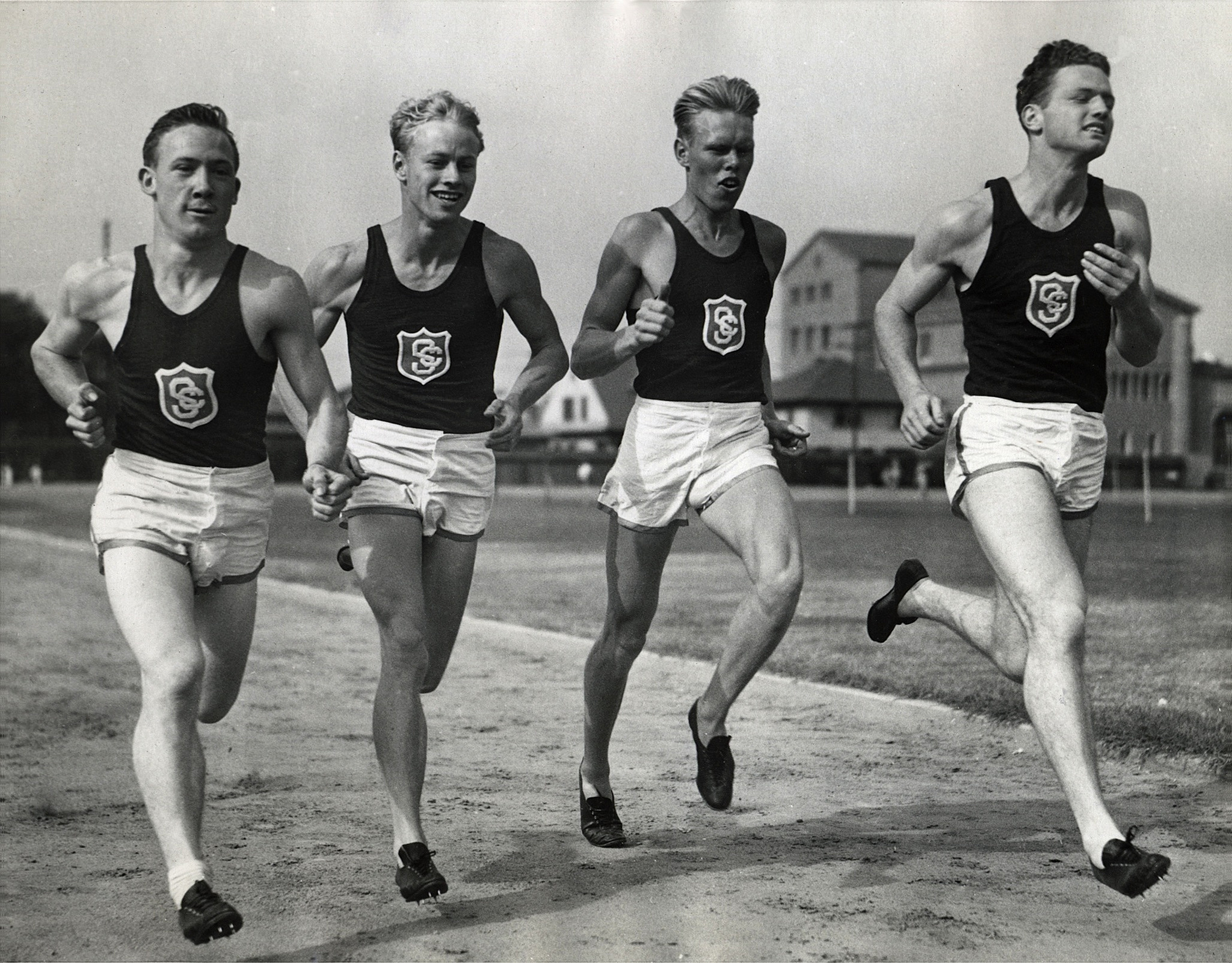 Historic photo of the USC men's relay team training