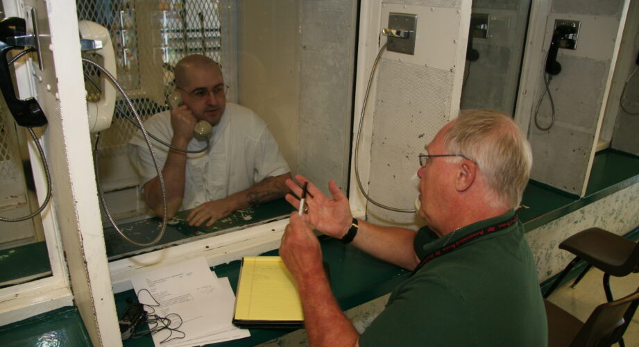 Associated Press reporter Michael Graczyk interviews death row inmate Juan Castillo in Texas. (Courtesy of Michael Graczyk)