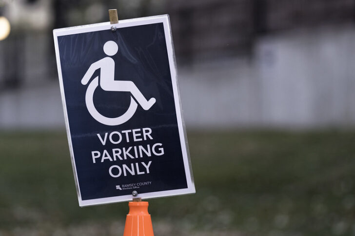 A disabled parking sign for voters